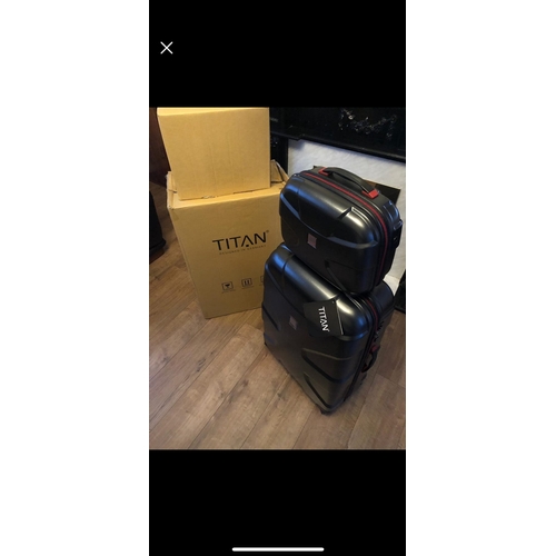 60a - New titan luggage set 
Beauty case rrp £90
Main case rrp £170