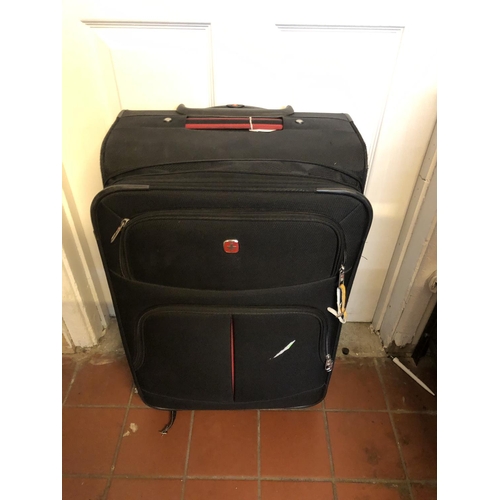 98 - Suitcase of mixed clothing