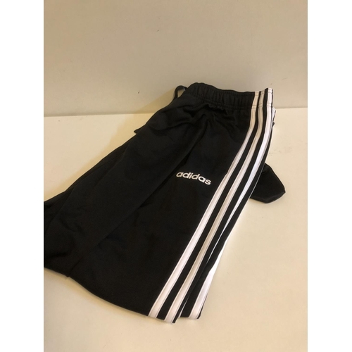 317 - Adidas track suit bottoms size UK L