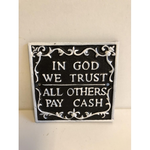 63 - Cast iron 'In God we trust all others pay cash' sign