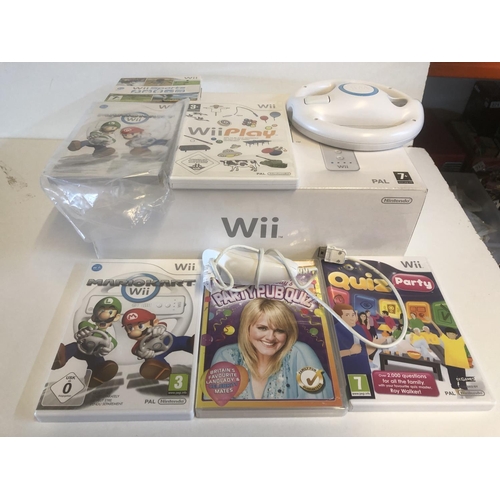 51 - Wii with games boxed & complete