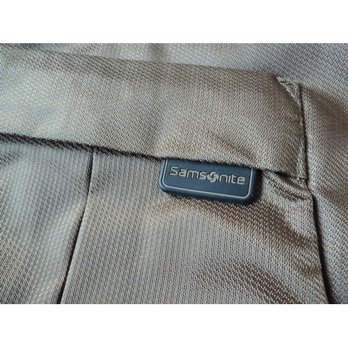 174 - Gold Samsonite manbag