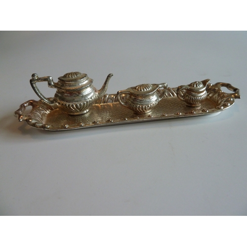 127 - Metal tray and trinkets