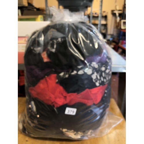 379 - Bag of womens clothing
from lost luggage