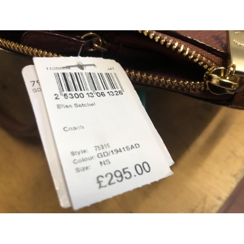 52 - New Coach handbag
Tagged at £295.00