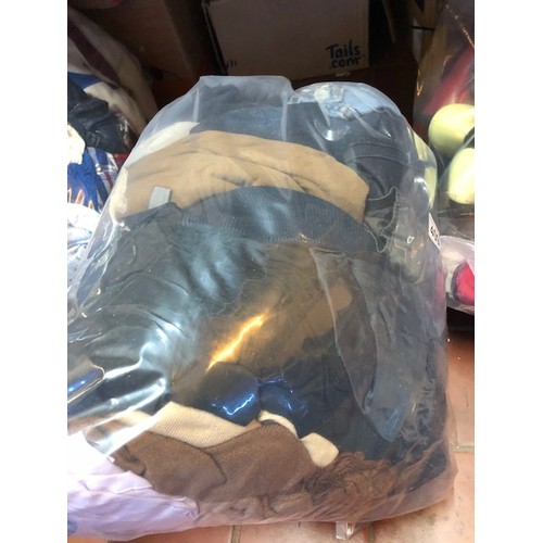 409 - Bag of mens clothing
from lost luggage