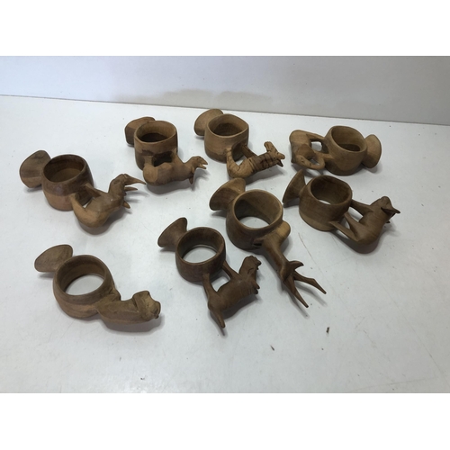 283 - Qty of carved napkin rings