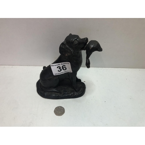 36 - A bronzed figure of a dog