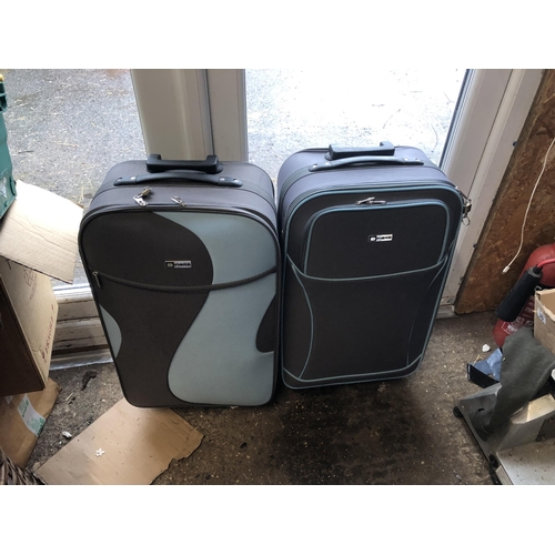 55 - Matching pair of suitcases