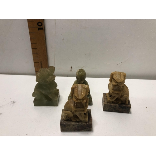 27 - X4 small carved stone figures