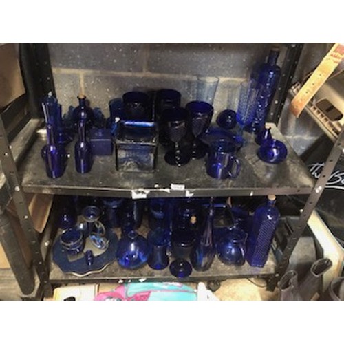 357 - Shelf & a half of blue glass
PLEASE NOTE NOT POSTABLE