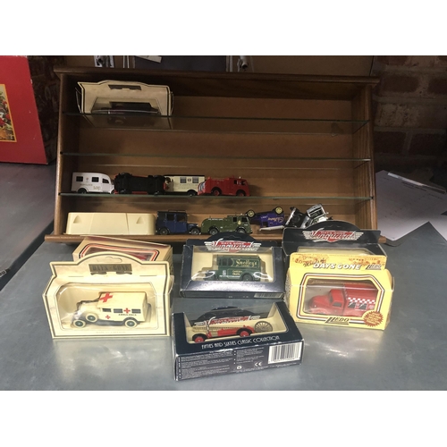 19 - Display case & cars