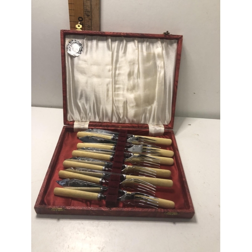 388 - Vintage knife & fork set