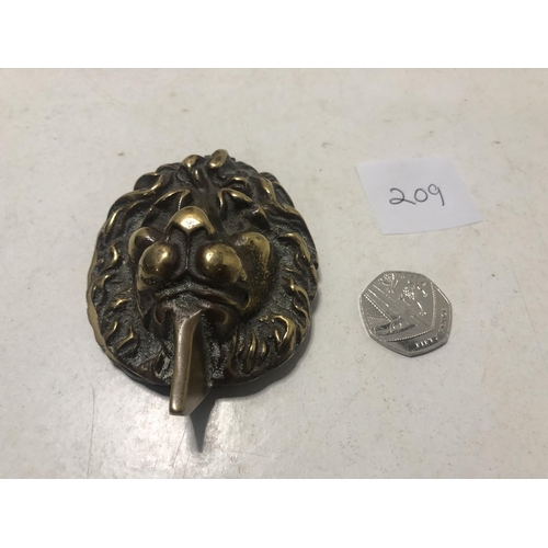 209 - Brass lions head door knocker