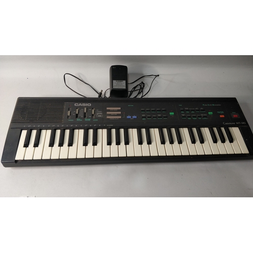 294 - Casio Casiotone MT-140 with charger