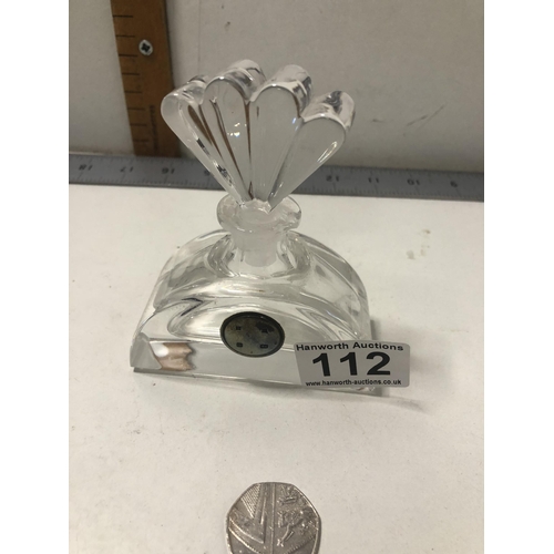 112 - Perfume bottle with HM silver label