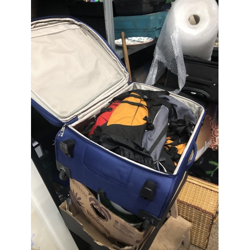 125 - Suitcase of bags