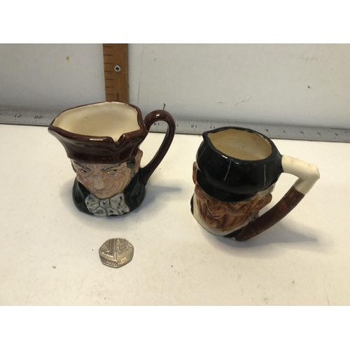 168 - X2 small Toby jugs
