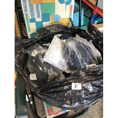 37 - Bag of new clothes