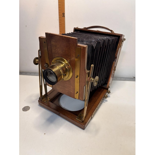 226 - Vintage sanderson folding camera and tripod