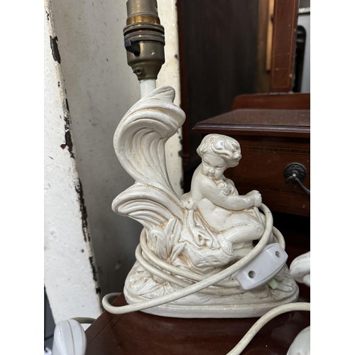 667 - Pair of Cherub Lamps