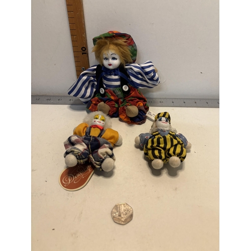 215 - X3 porcelain clowns/dolls