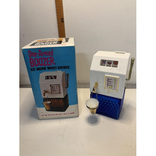 242 - One armed Boozer whiskey dispenser