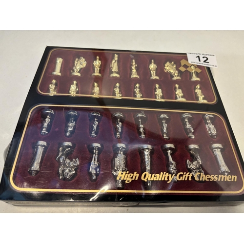 12 - Set of metal chess pieces