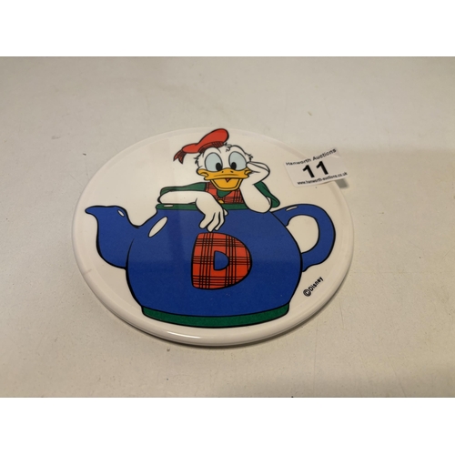 11 - Disney T-pot stand