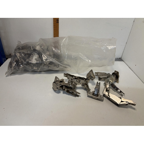 26 - Bag of kitchen cupboard hinges