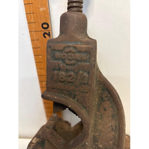 111 - Woodson 182A cast iron vise with clamp attachment and 20 cm scale rule in display.