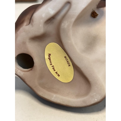 40 - Regency Fine Arts ceramic boxer figurine in seated pose.