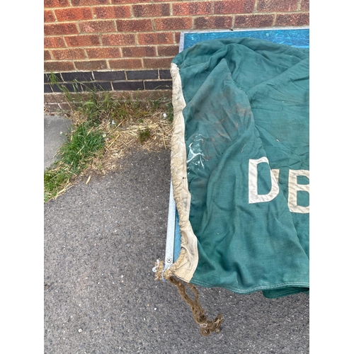 82 - Green fabric flag featuring 'Double Diamond' branding and overlapped 'DD' logo. Exhibits wear, disco... 