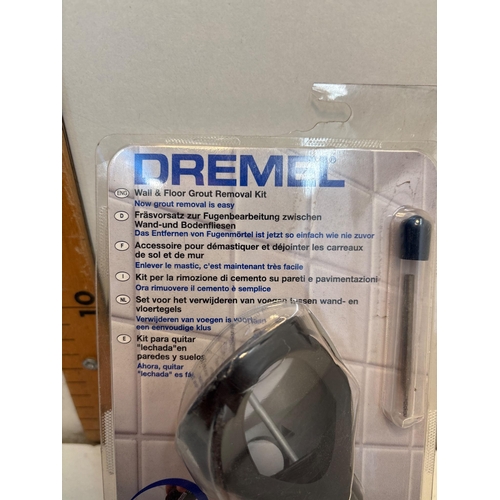 86 - Dremel wall and floor grout removal kit, model 568, includes an attachment and one bit, in original ... 