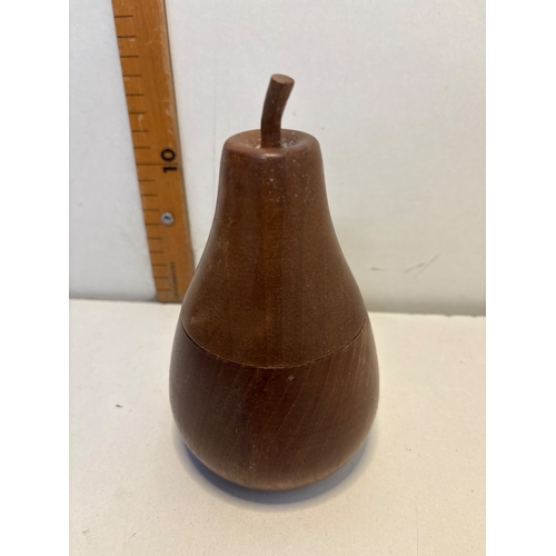 101 - Wooden container in pear shape with removable lid.