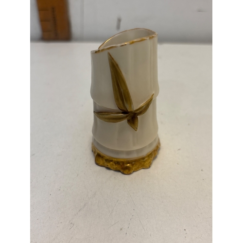 104 - Porcelain Royal Worcester vase with gold detailing and floral motif, marked 1049 on the base.