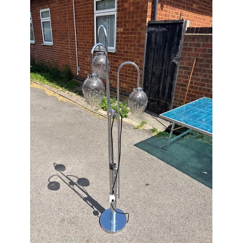 110 - Chrome floor lamp with three glass globe shades, in good condition.not postable