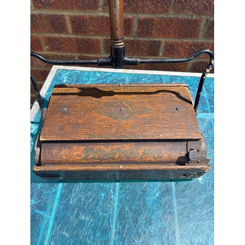 111 - Vintage wooden carpet sweeper with a metal handle, branded 'Pigur's No. 1'. Features metal hinges, m... 