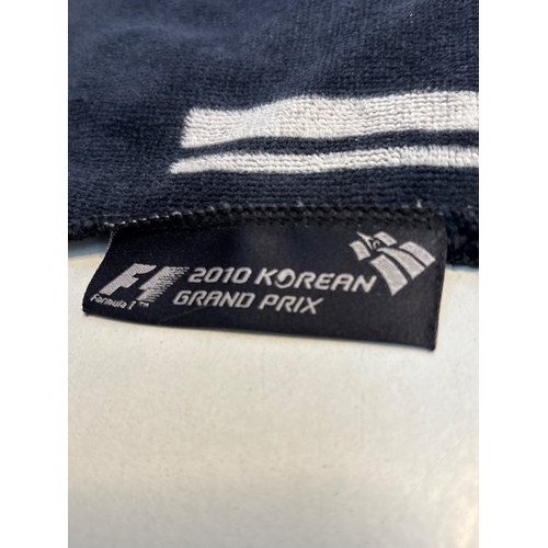 38 - 2010 Korean Grand Prix branded towel featuring the Korea International Circuit logo and Formula 1 br... 