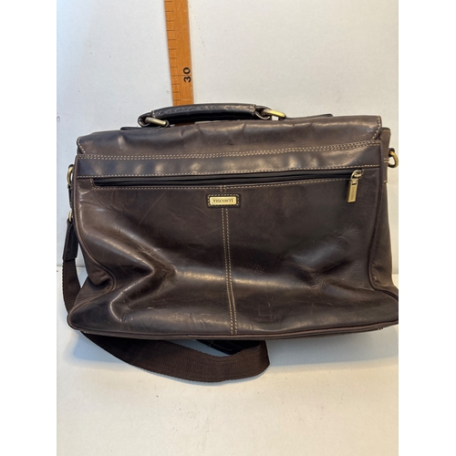 42 - Visconti brown leather shoulder bag with adjustable strap, buckle closures, and zippered back pocket... 