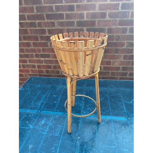 71 - Mid-century bamboo plant stand with a woven slatted design, tripod base, and ring support. Good stru... 