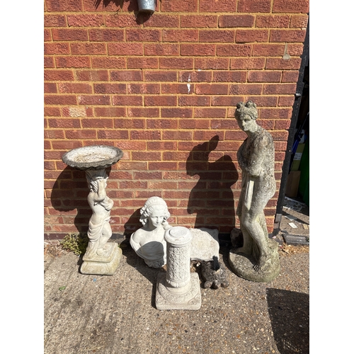 88 - Five outdoor stone statues including human and animal designs. Features a birdbath, classical bust, ... 