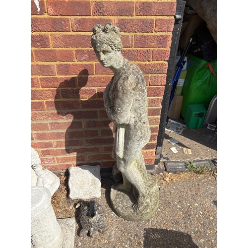 88 - Five outdoor stone statues including human and animal designs. Features a birdbath, classical bust, ... 