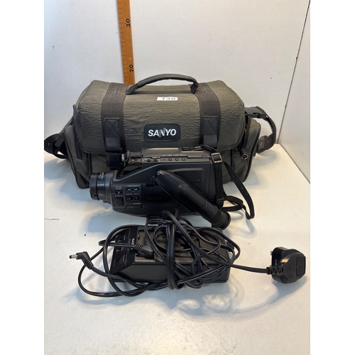 130 - Sanyo VHS camcorder model VM-D6P with accessories and bag.