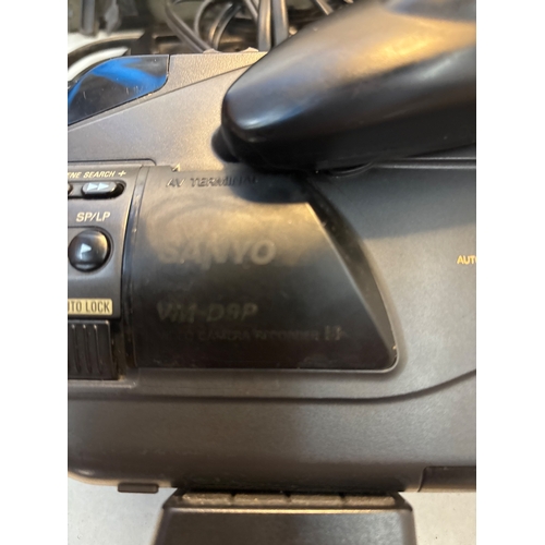 130 - Sanyo VHS camcorder model VM-D6P with accessories and bag.