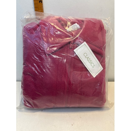 144 - Raspberry fleece jacket, size 12/14, new in packaging.