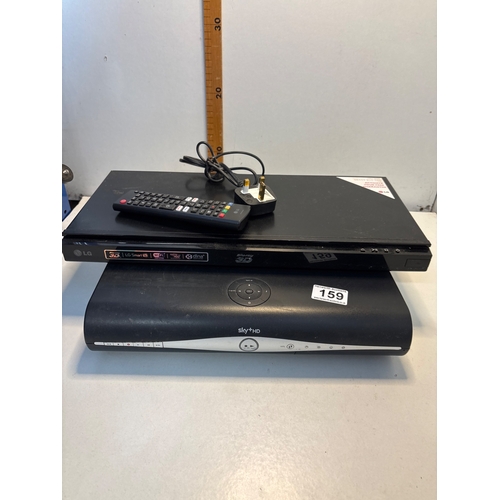 159 - LG Smart DVD player with Wi-Fi, remote control, and power cord, along with a Sky+ box.