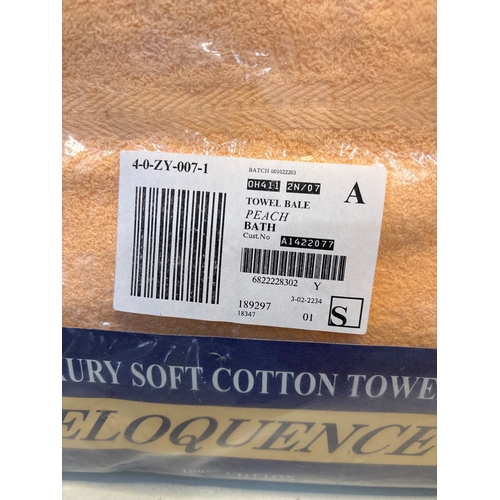 171 - Luxury soft cotton towel bale in peach color. New sealed package.