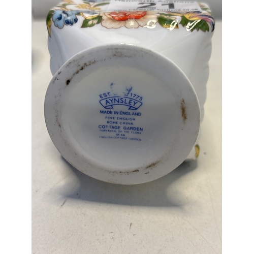 21 - Two Aynsley bone china vases featuring floral patterns. The taller vase is 'Cottage Garden' design, ... 