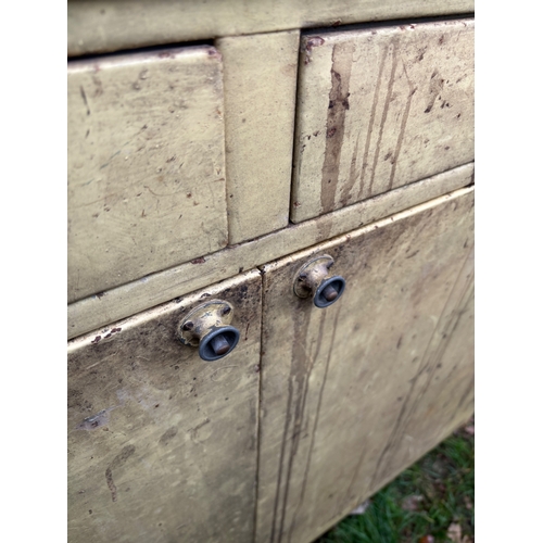49 - Metal industrial cabinet with two doors, one drawer, and distressed paint.
